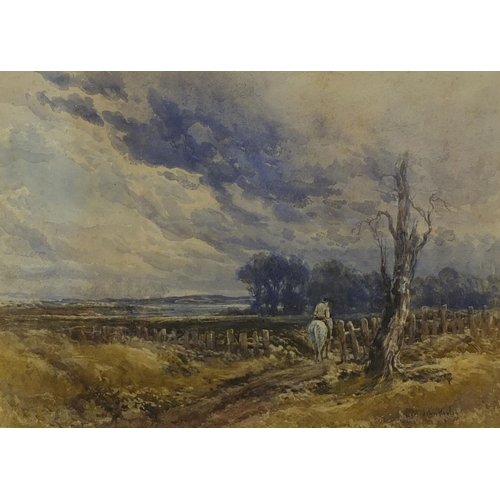 1317 - John Keeley - Watercolour, stormy day with a figure on horseback, inscribed verso, mounted and frame... 