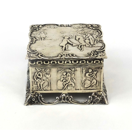 834 - Square silver box with lid, the lid embossed with a figure on a horseback and sides embossed with pa... 