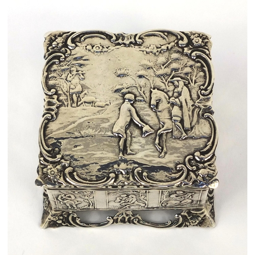 834 - Square silver box with lid, the lid embossed with a figure on a horseback and sides embossed with pa... 