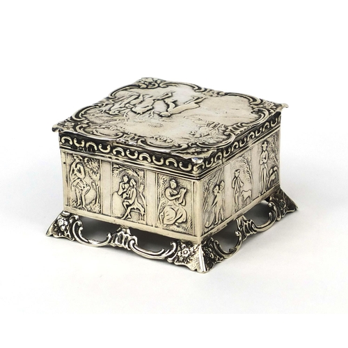 834 - Square silver box with lid, the lid embossed with a figure on a horseback and sides embossed with pa... 