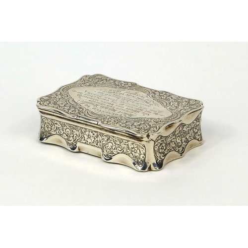 844 - Victorian rectangular silver snuff box with hinged lid and gilt interior, profusely engraved with fl... 