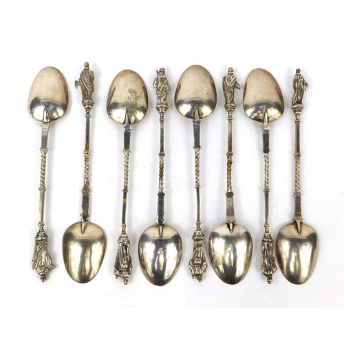 886 - Set of eight unmarked silver apostle spoons, 13.5cm long, approximate weight 134.6g