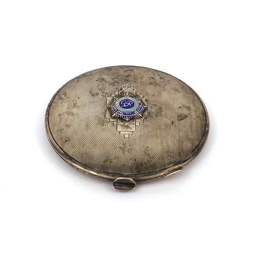 378 - Military interest circular compact with applied Royal Army service corps enamelled badge and engine ... 