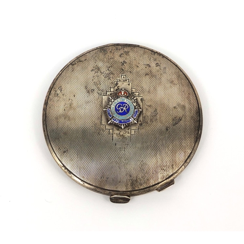 378 - Military interest circular compact with applied Royal Army service corps enamelled badge and engine ... 