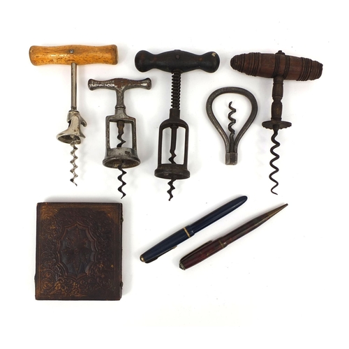 153 - Antique and later objects comprising five corkscrews, photograph of an elderly lady housed in a tool... 