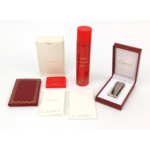 112 - Cartier silver plated pocket lighter with fitted box, gas refill and guarantees, the lighter 6cm hig... 