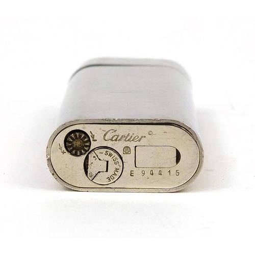 112 - Cartier silver plated pocket lighter with fitted box, gas refill and guarantees, the lighter 6cm hig... 