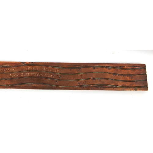 365 - British Military World War I copper tank track trench art, engraved with various names, housed in a ... 