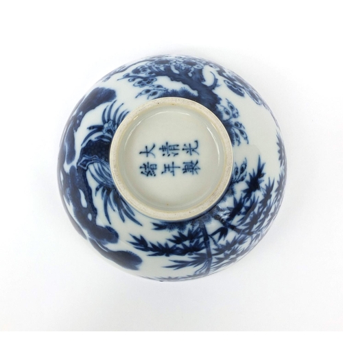 441 - Chinese blue and white porcelain bowl, hand painted with blossoming trees, six figure Guangxu charac... 