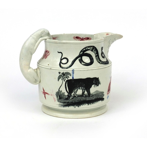 704 - Victorian pottery Menageries jug with moulded greyhound handle, decorated with various animals, 16cm... 