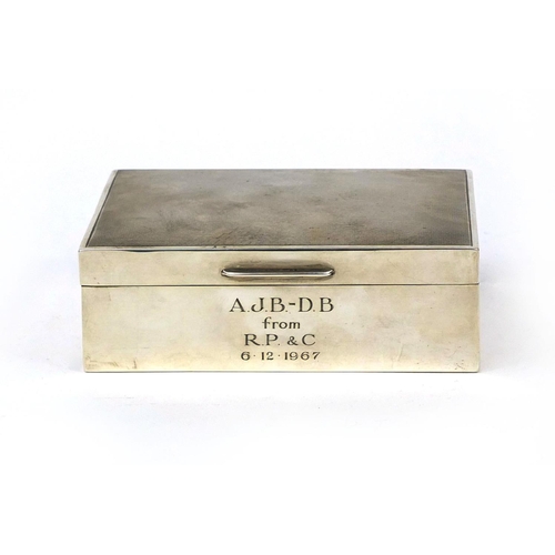 863 - Rectangular silver cigarette box, the hinged lid with engine turned decoration, P & B Birmingham 196... 