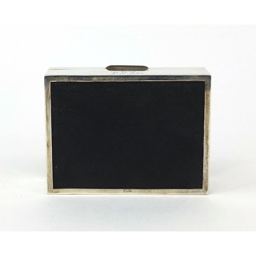 863 - Rectangular silver cigarette box, the hinged lid with engine turned decoration, P & B Birmingham 196... 