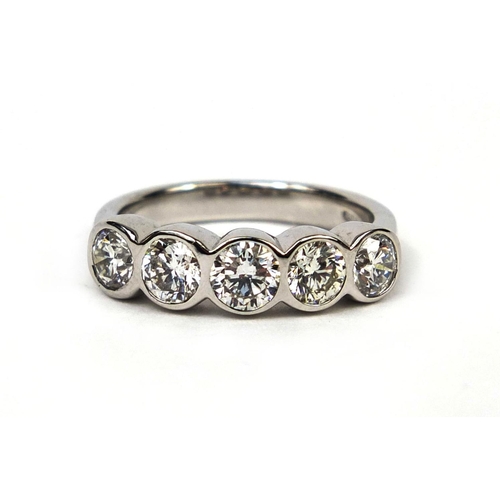 926 - 18ct white gold five stone diamond ring, size M, approximate weight 5.4g