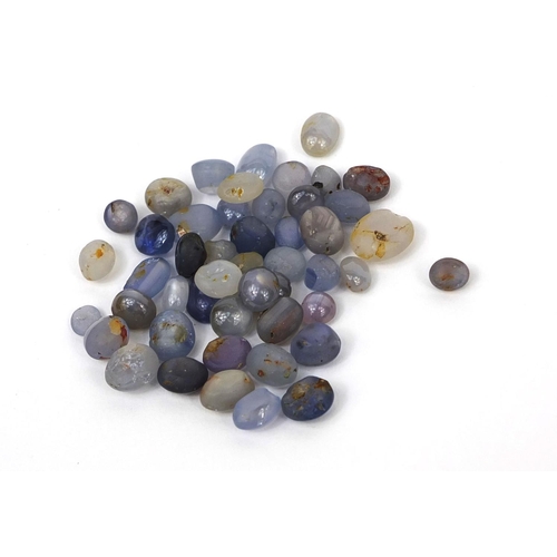 1038 - Large selection of cabochon sapphires including star sapphires