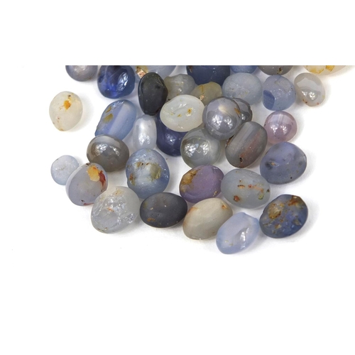 1038 - Large selection of cabochon sapphires including star sapphires