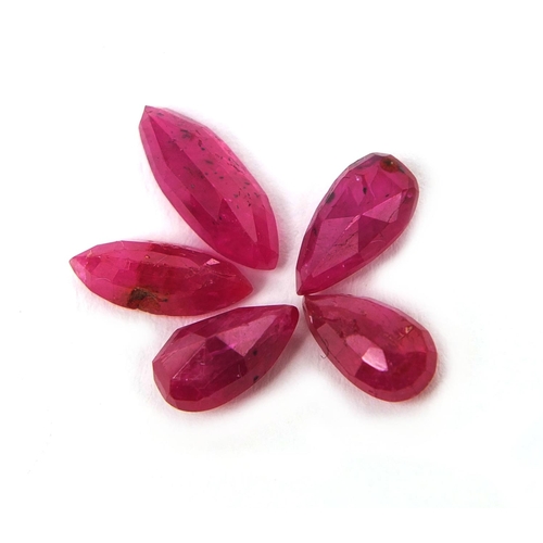 1031 - Five natural rubies, three pear shaped and two marquise shaped