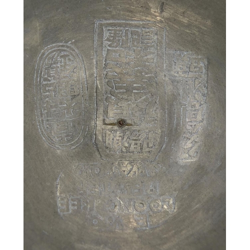 560 - Chinese Swatow pewter three footed censor and cover with twin handles, decorated with script, partia... 