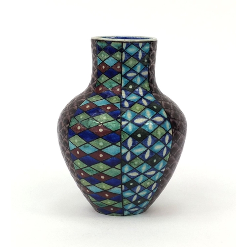 617 - Islamic Iznik pottery vase, hand painted with geometric motifs, 14cm high