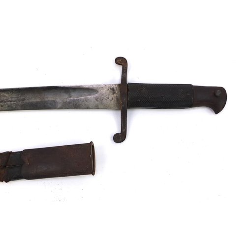 392 - Military interest bayonet and leather scabbard with wooden grip, 71cm in length