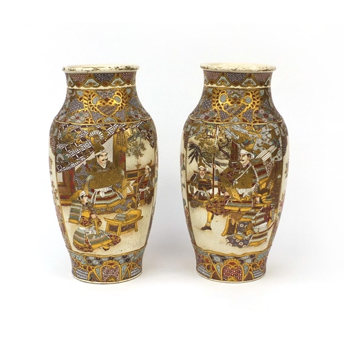 504 - Large pair of Japanese Satsuma pottery vases, hand painted and gilded with figures within foliate bo... 