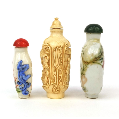 524 - Three Chinese snuff bottles comprising two porcelain examples, both hand painted with birds and one ... 