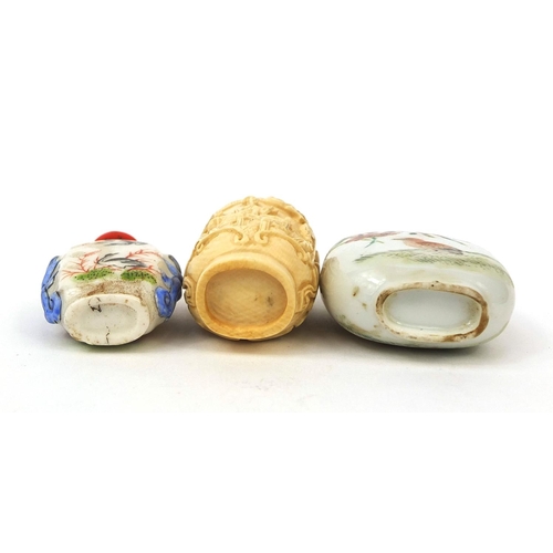 524 - Three Chinese snuff bottles comprising two porcelain examples, both hand painted with birds and one ... 