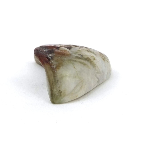 514 - Chinese carved jade pendant of naturalistic form with incised decoration, 7cm in length