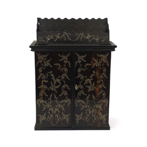 644 - Anglo-Indian inlaid rosewood and ivory table cabinet, decorated with floral motifs, fitted with a le... 