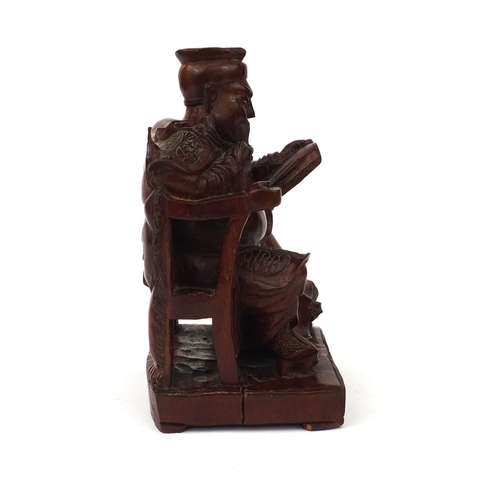 544 - Chinese root carving of a seated Emperor holding a scroll, 28cm high