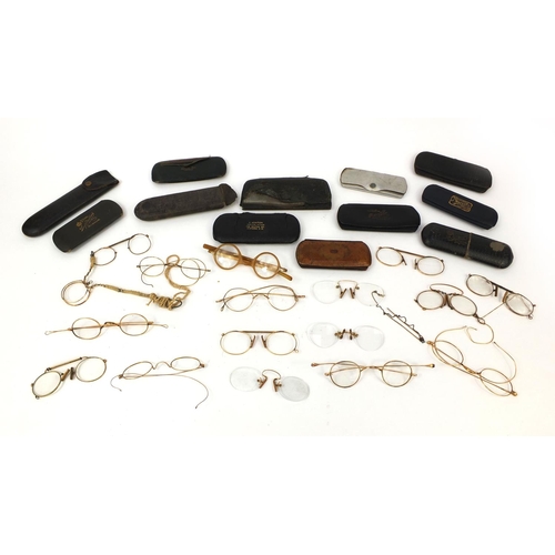 76 - Collection of vintage spectacles, mostly gold coloured metal examples, most with cases including a g... 