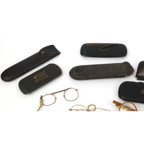 76 - Collection of vintage spectacles, mostly gold coloured metal examples, most with cases including a g... 