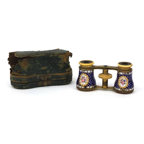 73 - Pair of French brass and enamelled opera glasses with ivory eye pieces, the enamelled barrels hand p... 