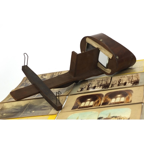 195 - Group of stereoscopic view cards and a stereoscopic card viewer, the cards including battleships and... 