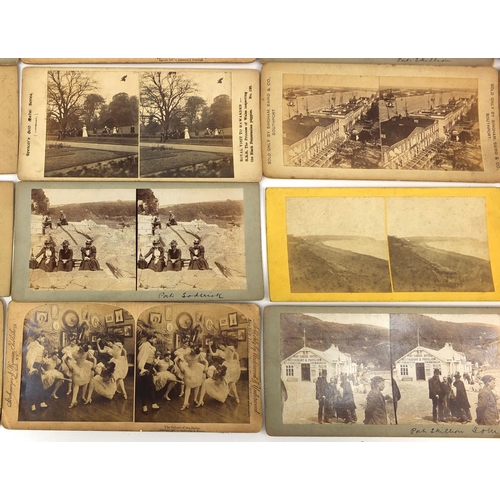 195 - Group of stereoscopic view cards and a stereoscopic card viewer, the cards including battleships and... 