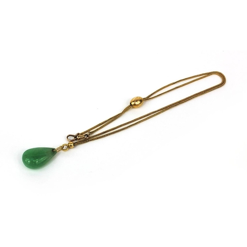 507 - Chinese green jade pendant on gold chain, the pendant 2.2cm in length, approximate weight 8.5g