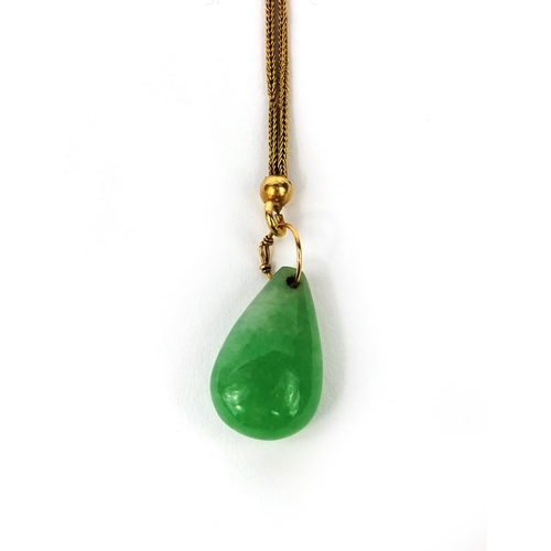 507 - Chinese green jade pendant on gold chain, the pendant 2.2cm in length, approximate weight 8.5g