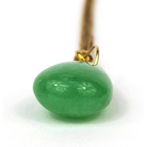 507 - Chinese green jade pendant on gold chain, the pendant 2.2cm in length, approximate weight 8.5g