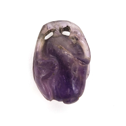 511 - Chinese carved amethyst pendant in the form of a fruit, 3cm high