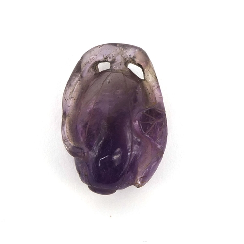 511 - Chinese carved amethyst pendant in the form of a fruit, 3cm high