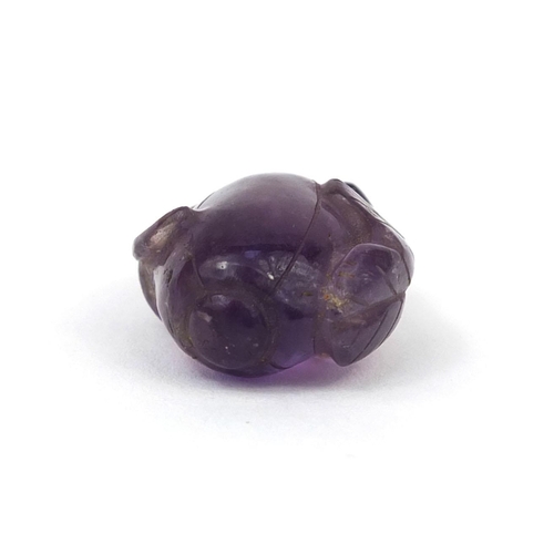 511 - Chinese carved amethyst pendant in the form of a fruit, 3cm high