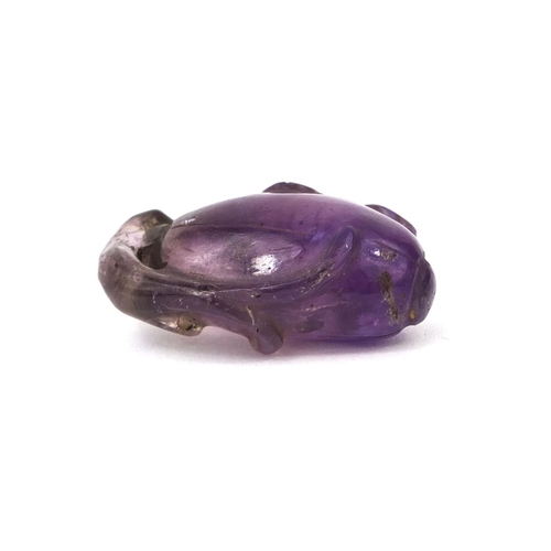 511 - Chinese carved amethyst pendant in the form of a fruit, 3cm high