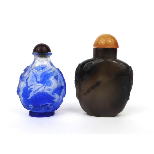 521 - Four Chinese hard stone and glass carvings and scent bottles, comprising a cameo glass scent bottle ... 