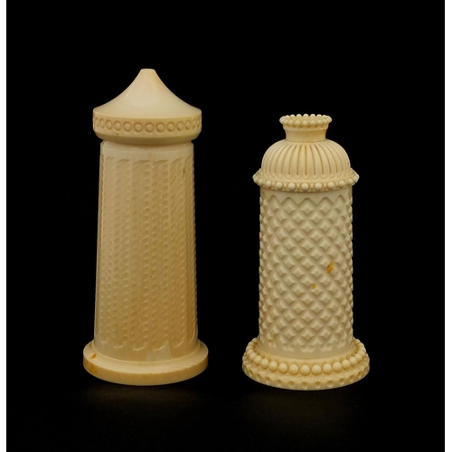 7 - Two carved ivory pots, one salt and one pepper, the largest 11cm high, (PROVENANCE: 1934 exhibition ... 