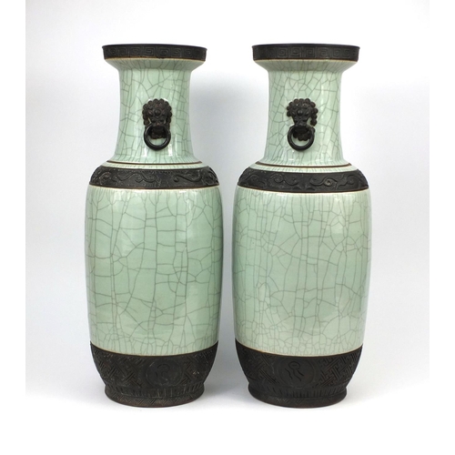 462 - Large pair of Chinese celadon crackle glazed vases, each with animalia ring handles and relief drago... 