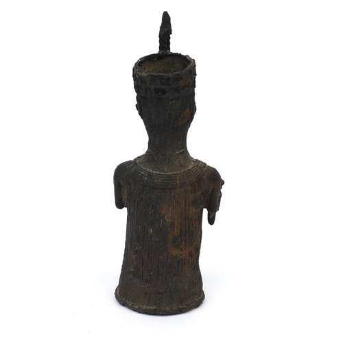 631 - African Benin style bronze tribesman, 26cm high