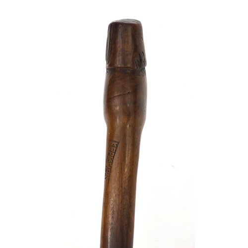 162 - Hardwood walking stick, the pommel carved in the form of a man wearing a fez, carved Kebkvpa, 95cm i... 