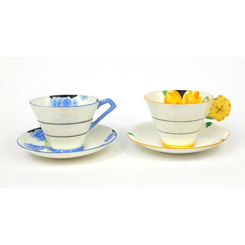 788 - Two Art Deco Paragon cups and saucers, one with butterfly handle, each hand painted with flowers, ea... 