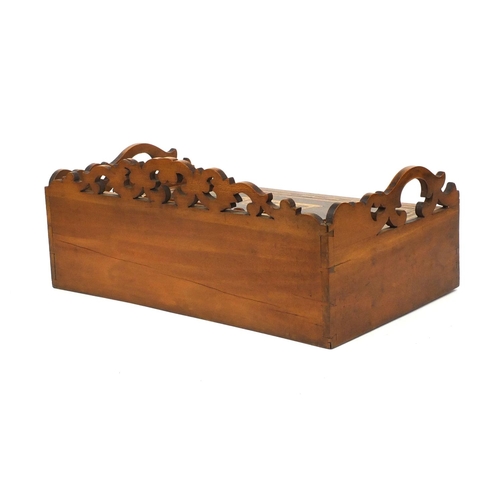 33 - Sorrento ware olive wood writing slope, with carrying handles and pierced gallery, the lid inlaid wi... 