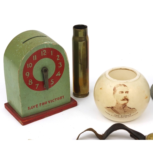 376 - Military related objects including a Buren silver cased trench watch, trench art, Carlton ware Lord ... 