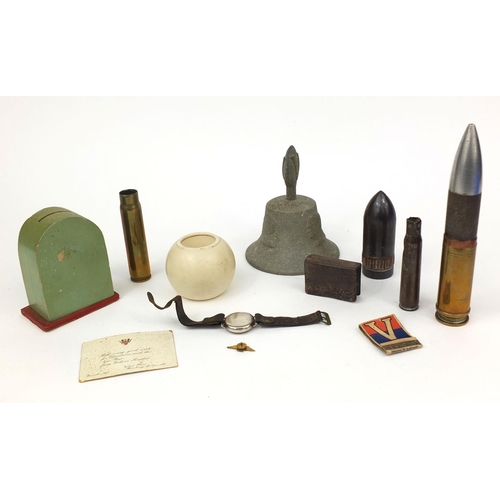 376 - Military related objects including a Buren silver cased trench watch, trench art, Carlton ware Lord ... 